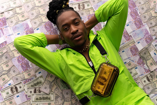 Why do rappers wear bling?